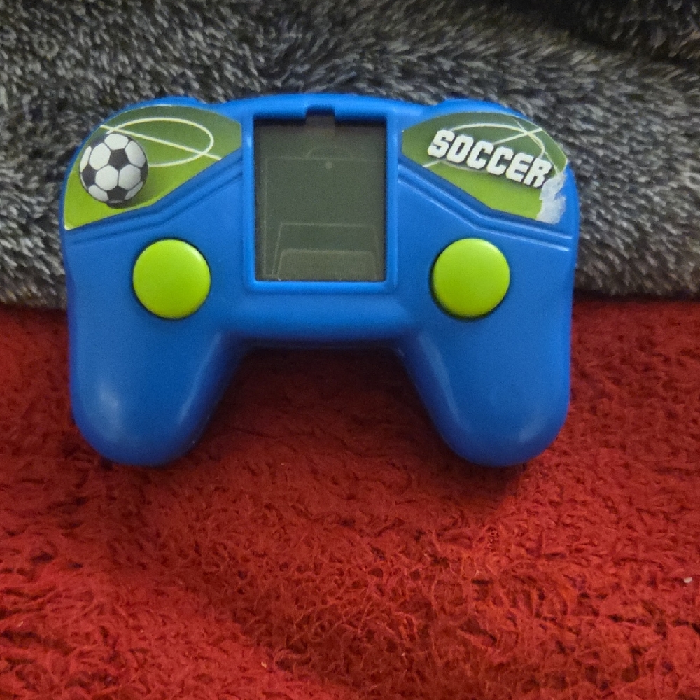 Blue and Green Soccer Handheld Game Controller